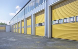 yellow garage doors with windows commerical building Vancouver Wa