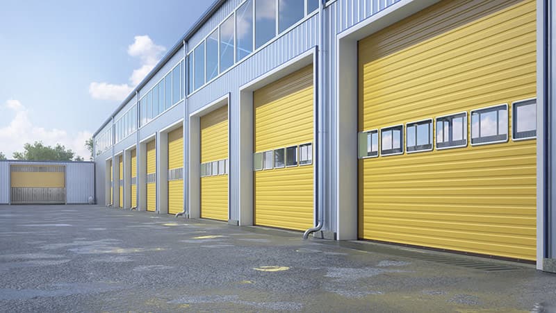 yellow garage doors with windows commerical building Vancouver Wa