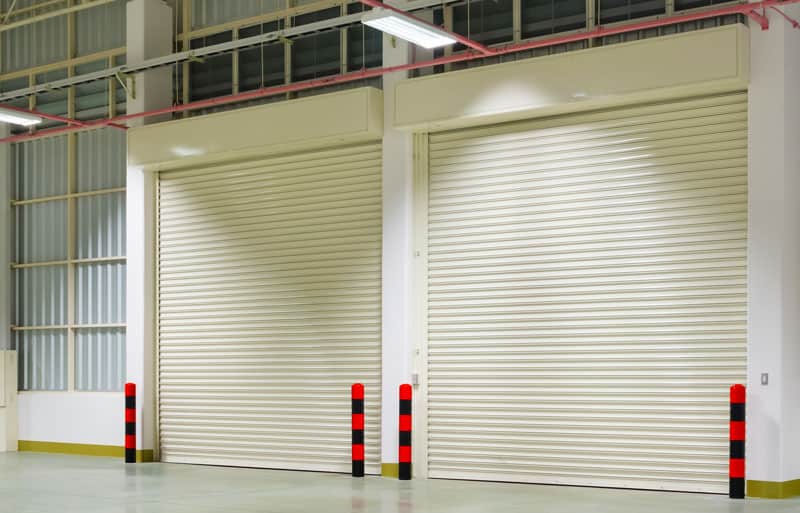 Installation of two warehouse overhead garage doors Garage Harmony